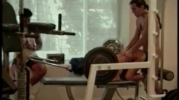 Sexy slut in sports bra takes two cocks during workout